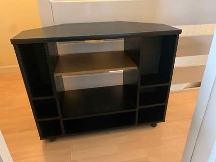 Photo of free Black corner TV stand with wheels (South Harrow HA2) #2
