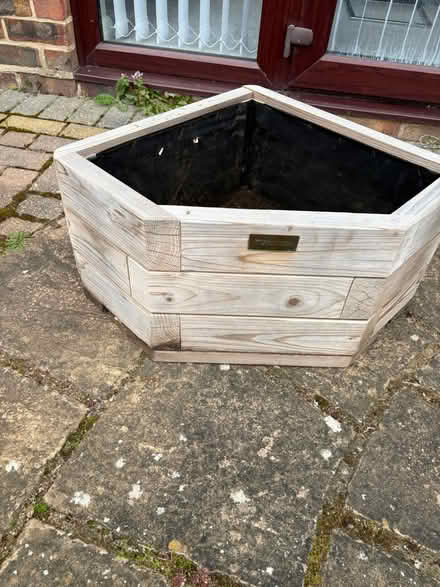 Photo of free Wooden corner planter (West Winch PE33) #3