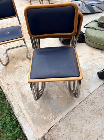 Photo of free Stacked chairs x12 (CH49) #1