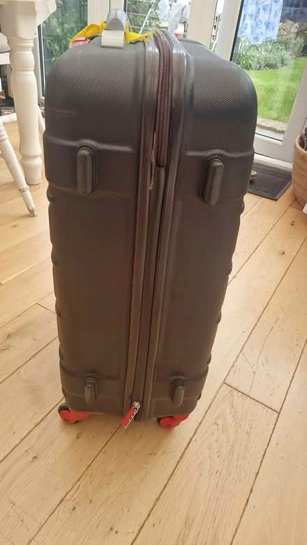 Photo of free Medium hard shelled suitcase (TN40 chantry Bexhill) #1