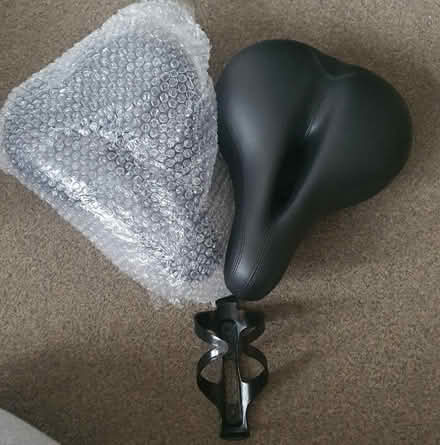 Photo of free 2 standard excersize bike seat as new and drink bottle holde (Lower Stondon SG16) #1