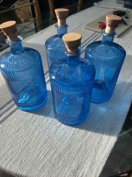 Photo of free 4 empty blue gunpowder bottles with stoppers (BT7) #1