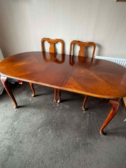 Photo of free mahogany colour solid wood oval dining table sits 4-6 (Bexleyheath DA7) #1