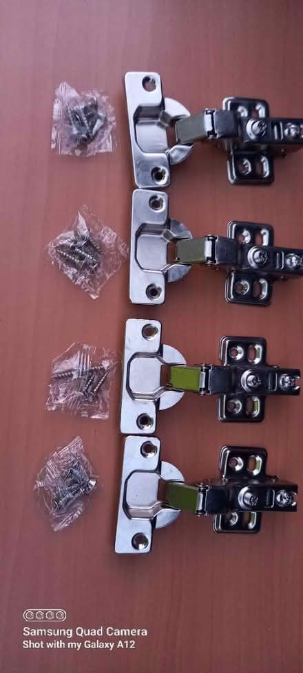 Photo of free 4 cabinet hinges (Shepshed LE12) #1