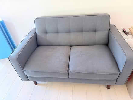 Photo of free Blue loveseat from living spaces (Almond Ave) #1