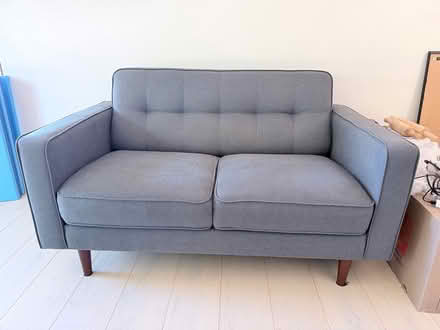 Photo of free Blue loveseat from living spaces (Almond Ave) #2