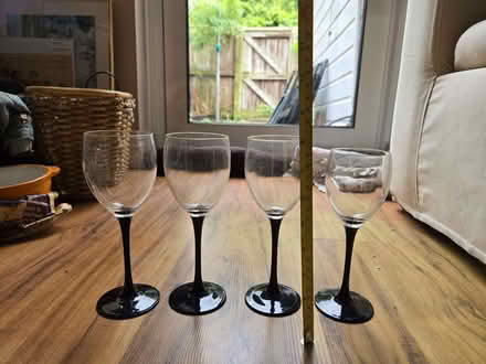 Photo of free 3 + 1 Tall Black stem wine glasses (Northcote Road SW11) #1