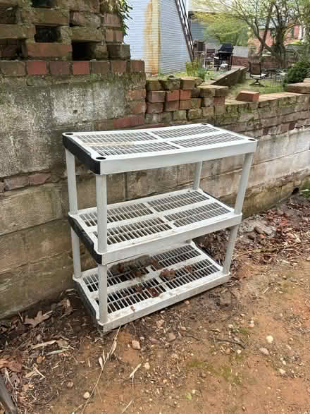 Photo of free Plastic utility shelf (S. 26th St. & S. Ives St) #1