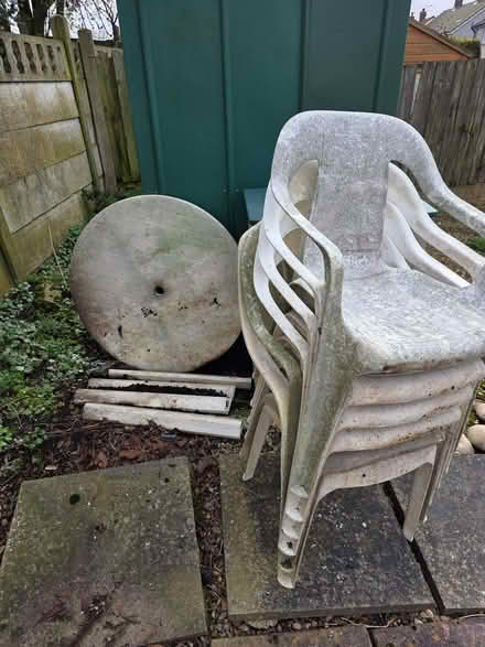 Photo of free 6 white plastic garden chairs and table (Bentley WS2) #1
