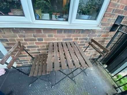 Photo of free Outside table + 2 chairs (by Clissold Park N16) #1