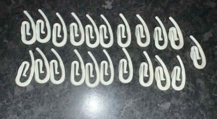 Photo of free 21 clean white plastic curtain hooks (Tolworth KT6) #1