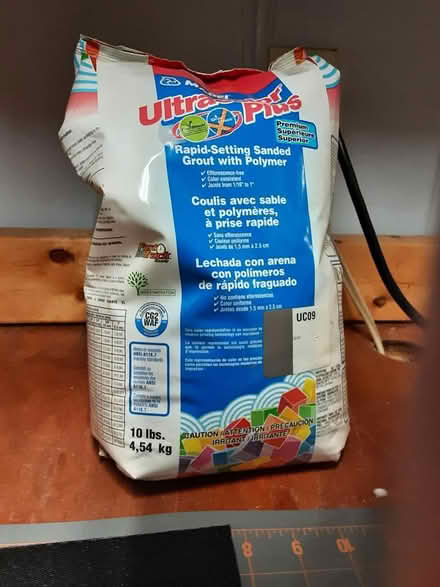Photo of free Unopened 10lb bag of Sanded Grout (Carlingwood) #1