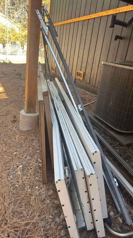 Photo of free 9 foot garage door panels and track (Saddle road and June way) #1