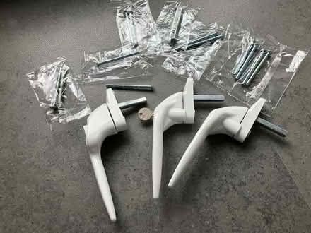Photo of free 3 white upvc window handles + 7 x packs of pairs of screws (Cheadle Hulme SK8) #1