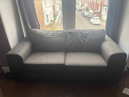 Photo of free 2 seater grey sofa (Emlyn Gardens W12) #1