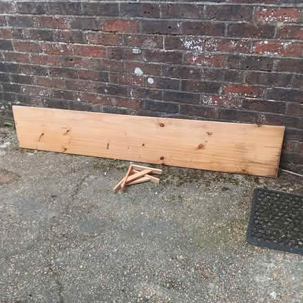 Photo of free Pine shelf and 2 brakets (Hailsham BN27) #1