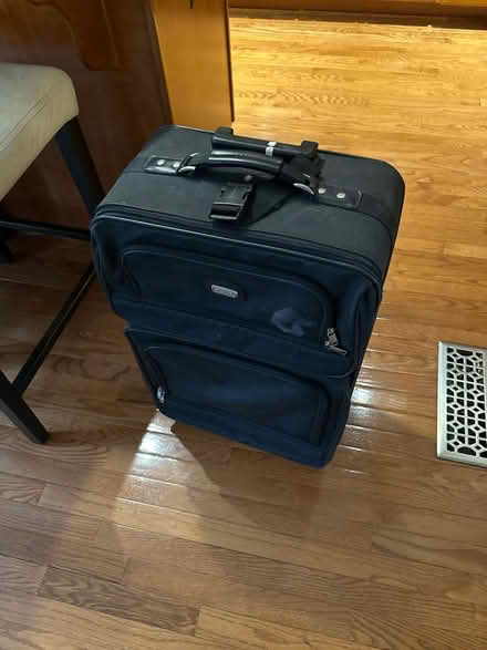 Photo of free Suitcase (Maple Lawn) #1