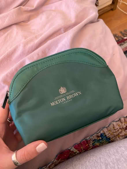 Photo of free Molton Brown green cosmetics bag (RG4) #1