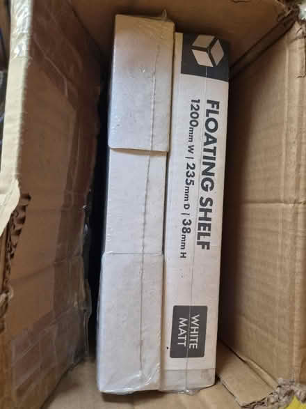 Photo of free 2 unpacked floating shelves. (Woking GU21) #1