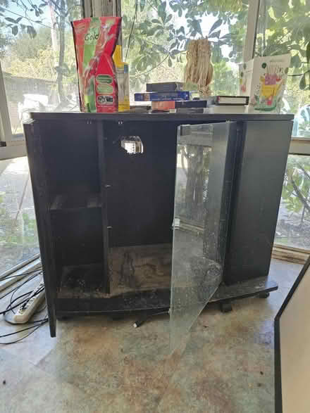 Photo of free Black TV stand glass door (Los Altos) #1