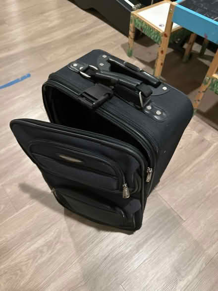 Photo of free Carry on suitcase (Maple Lawn) #1