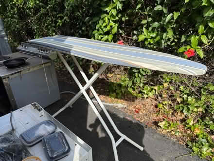 Photo of free Folding ironing board with cover (1075 Valencia Avenue) #1