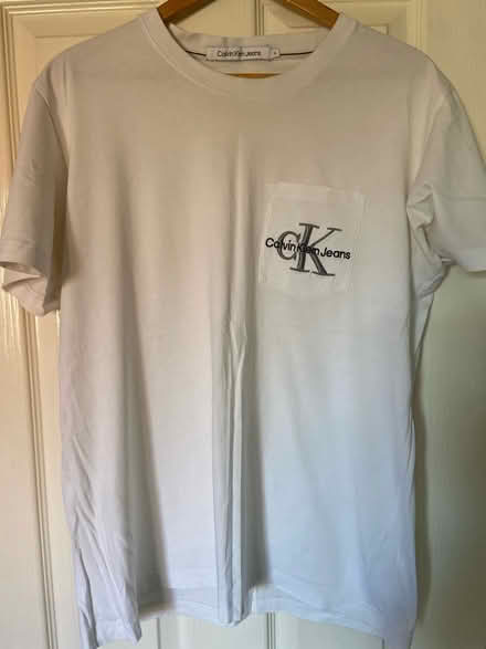 Photo of free XL White CK T Shirt with logo (Hucclecote GL3) #1