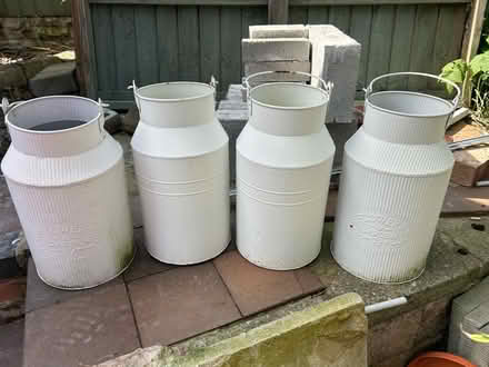 Photo of free White milk churn style planters (Bayston Hill SY3) #1