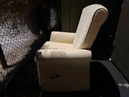 Photo of free Beige swiveling recliner chair (1075 Valencia Avenue) #1