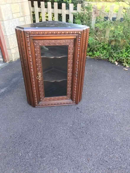 Photo of free Glass-fronted corner wall cabinet (Oxenton GL52) #1