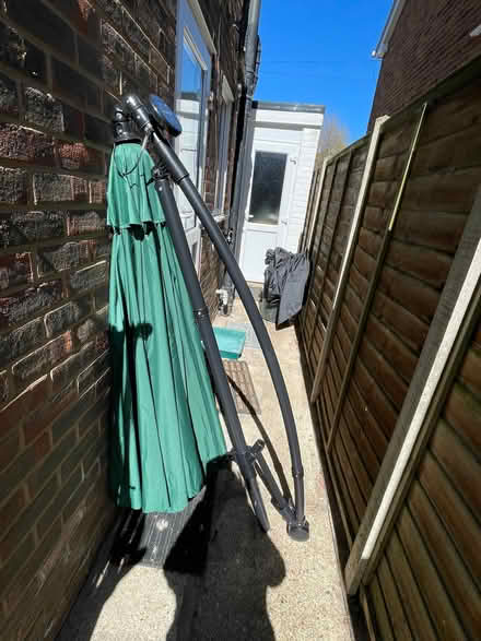 Photo of free Green “ Banana” Garden Parasol, 2.7metre diameter with cover (Dedworth SL4) #1