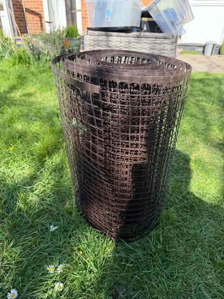 Photo of free About 4m of 50cm high brown plastic fencing (Woodley RG5) #1