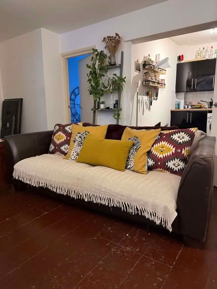 Photo of free Large Brown Leather Sofa with throw and cushions (Hoxton N1) #2