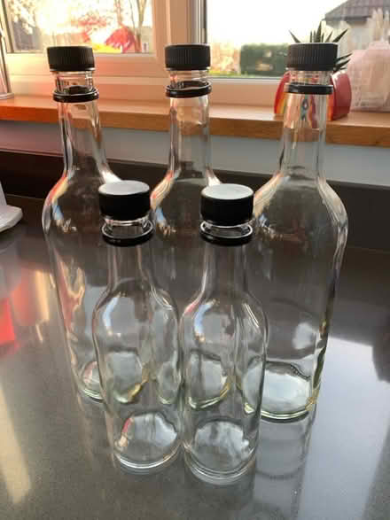 Photo of free 5 clear glass bottles (1L & 500ml) (Norton Lees S8) #1