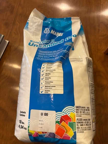 Photo of free Unsanded Grout/Tile (Stevensville) #1