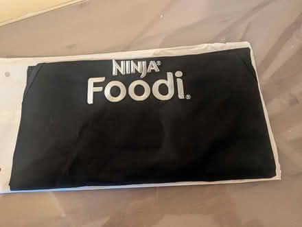 Photo of free Cooking apron, black branded with Ninja Foodi (Chesser EH14) #1