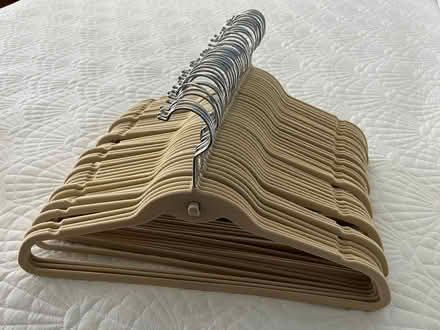 Photo of free Ivory Velvet Stackable Hangers (Troy, VA) #1