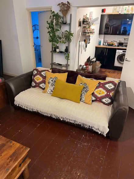 Photo of free Large Brown Leather Sofa with throw and cushions (Hoxton N1) #1