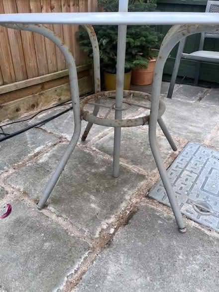 Photo of free Grey round garden table, 4 chairs & parasol (yellow) (Putney SW15) #4