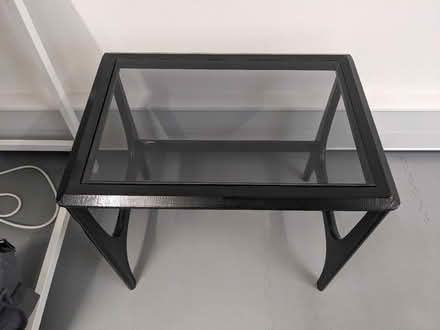 Photo of free Glass top black table (N5 2EF) #1
