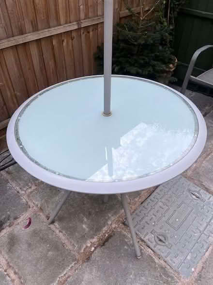 Photo of free Grey round garden table, 4 chairs & parasol (yellow) (Putney SW15) #3