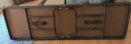 Photo of free Table w folding legs 8ft long (South Chelmsford) #1