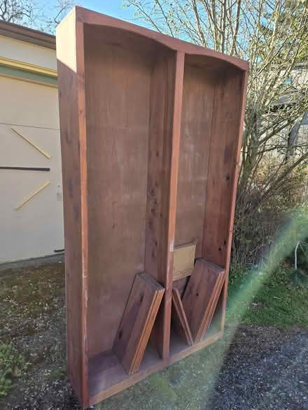 Photo of free Tall wood bookshelf (West Seattle) #3