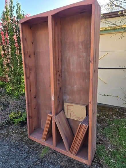 Photo of free Tall wood bookshelf (West Seattle) #2