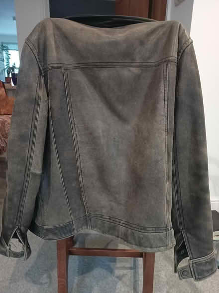Photo of free Old black leather jacket. Well worn (Godalming GU7) #3