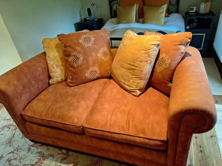 Photo of free Two Seater Settee Terracotta.Very comfortable. (Gamblesby CA10) #1