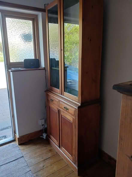Photo of free Tall glass fronted cabinet (New Greens) #1