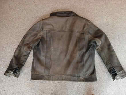 Photo of free Old black leather jacket. Well worn (Godalming GU7) #4