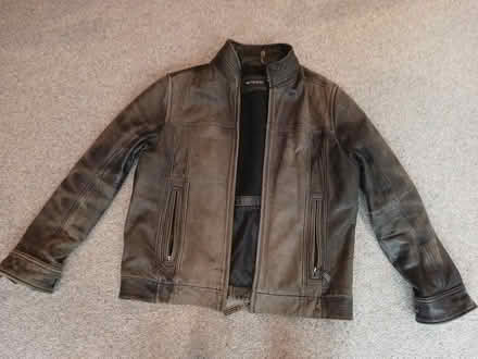Photo of free Old black leather jacket. Well worn (Godalming GU7) #2