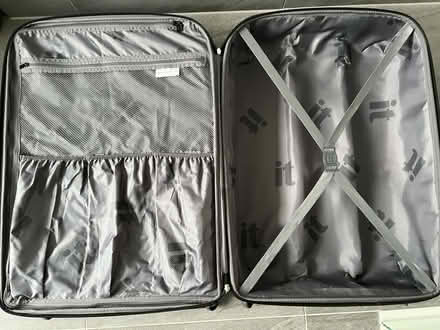 Photo of free Large charcoal grey suitcase (Upminster RM14) #3